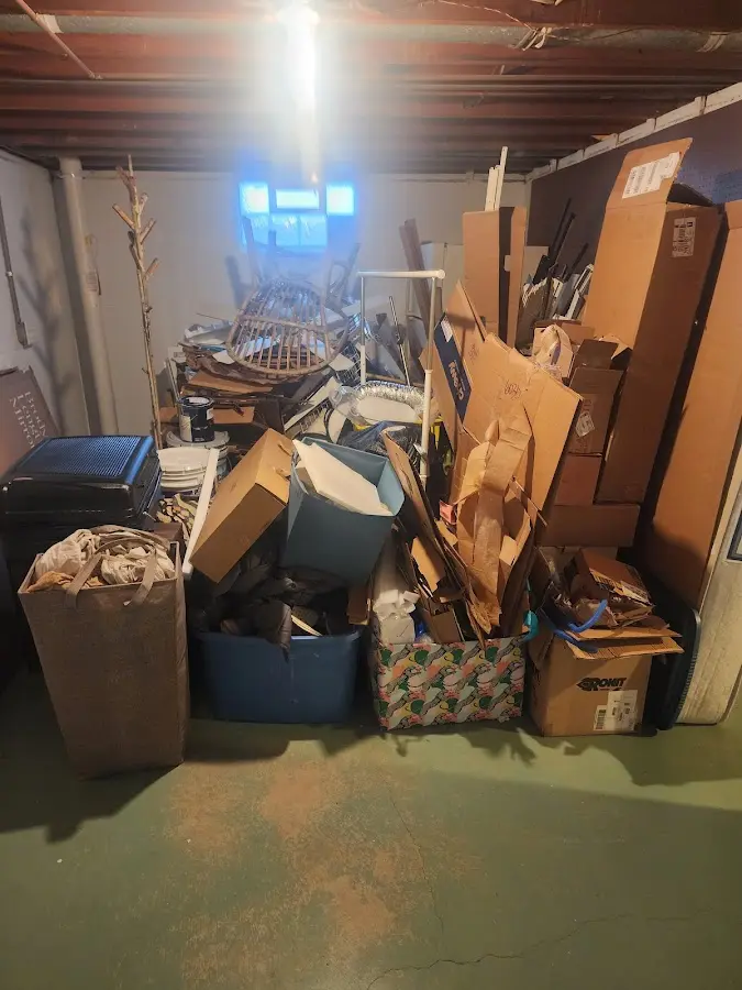 Roll-off dumpster container at job site for 8 Yard Dumpster Rental in Mayfield Heights